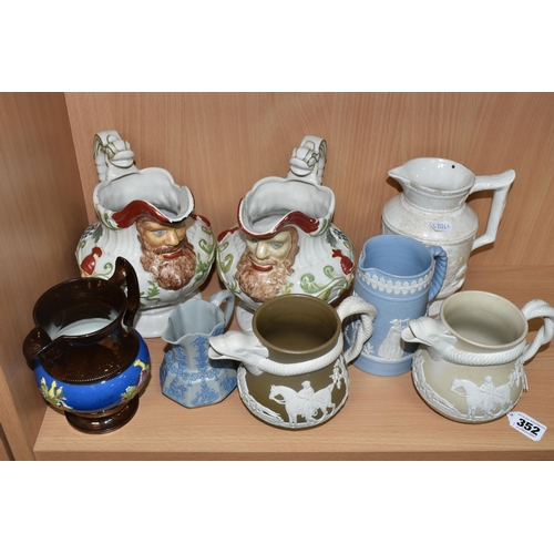 352 - A GROUP OF NINETEENTH CENTURY CERAMICS, comprising two jasperware-style jugs, with spout in the form... 