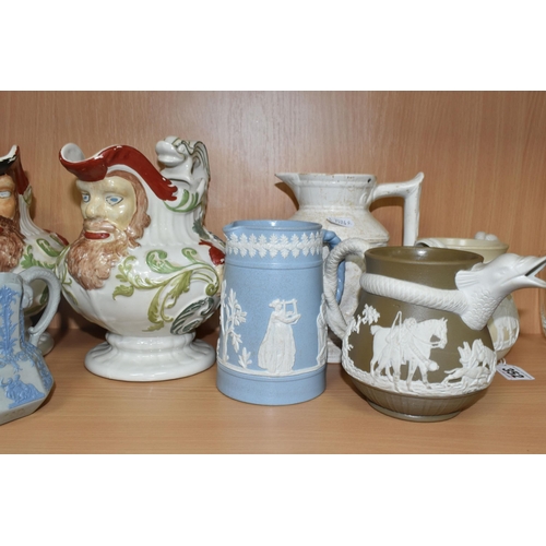 352 - A GROUP OF NINETEENTH CENTURY CERAMICS, comprising two jasperware-style jugs, with spout in the form... 