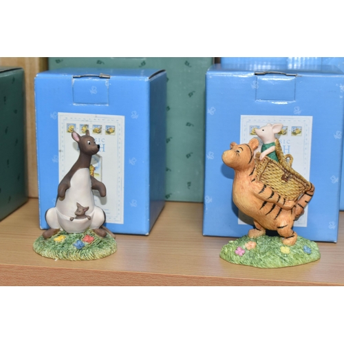 379 - A COLLECTION OF BOXED WINNIE THE POOH COLLECTABLES, comprising Border Fine Arts 'Classic Pooh': Pooh... 