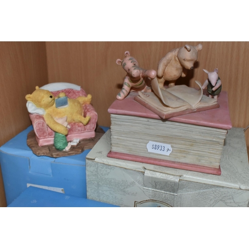 379 - A COLLECTION OF BOXED WINNIE THE POOH COLLECTABLES, comprising Border Fine Arts 'Classic Pooh': Pooh... 