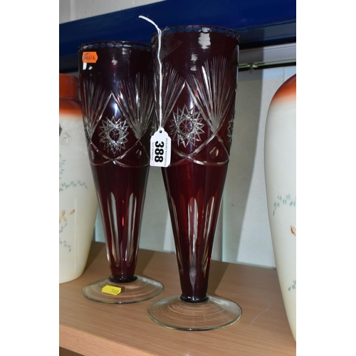 388 - TWO PAIRS OF EARLY 20TH CENTURY GLASS VASES, comprising a pair of Bohemian cranberry cut to clear gl... 