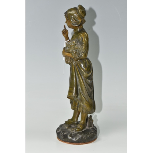 389 - A BRONZED CAST METAL FIGURE OF A YOUNG DUTCH GIRL WITH FLOWERS, height 32.5cm, possibly one of a pai... 