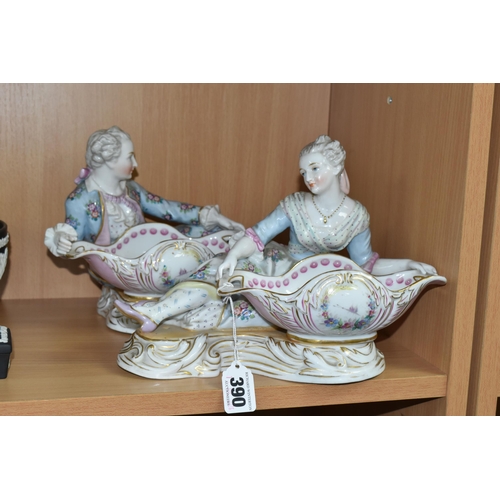 390 - A PAIR OF CONTINENTAL PORCELAIN FIGURAL BON BON DISHES, modelled with a recumbent young gentleman an... 