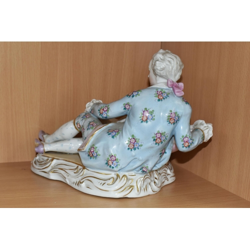 390 - A PAIR OF CONTINENTAL PORCELAIN FIGURAL BON BON DISHES, modelled with a recumbent young gentleman an... 