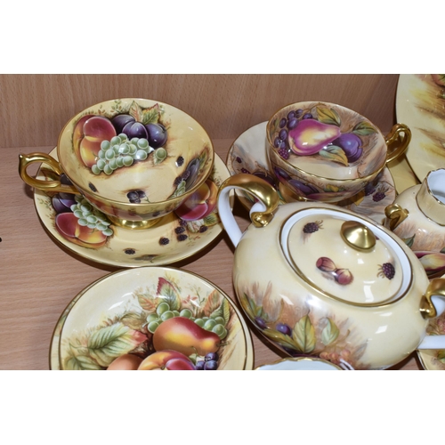 395 - A GROUP OF AYNSLEY 'ORCHARD GOLD' TEAWARE, comprising a twin handled covered sugar bowl with printed... 