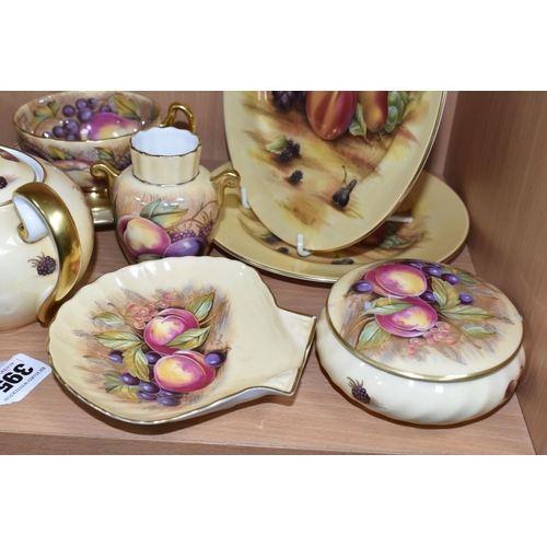 395 - A GROUP OF AYNSLEY 'ORCHARD GOLD' TEAWARE, comprising a twin handled covered sugar bowl with printed... 