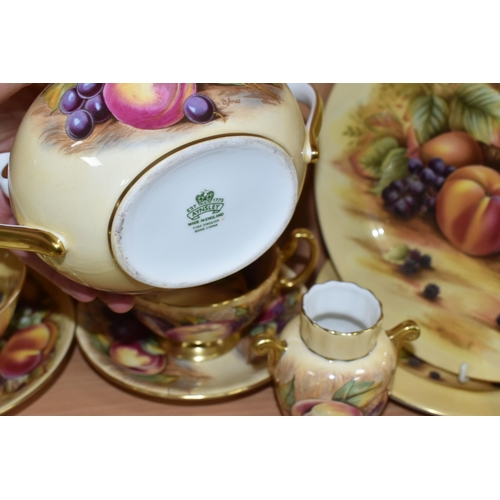 395 - A GROUP OF AYNSLEY 'ORCHARD GOLD' TEAWARE, comprising a twin handled covered sugar bowl with printed... 