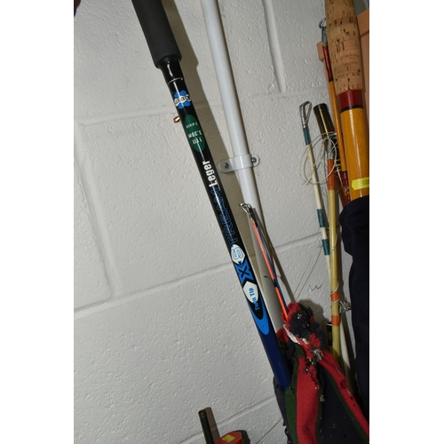 400 - A LARGE COLLECTION OF VINTAGE FISHING RODS, comprising a split cane 'Black Seal' 7432 rod, a 6m Midd... 