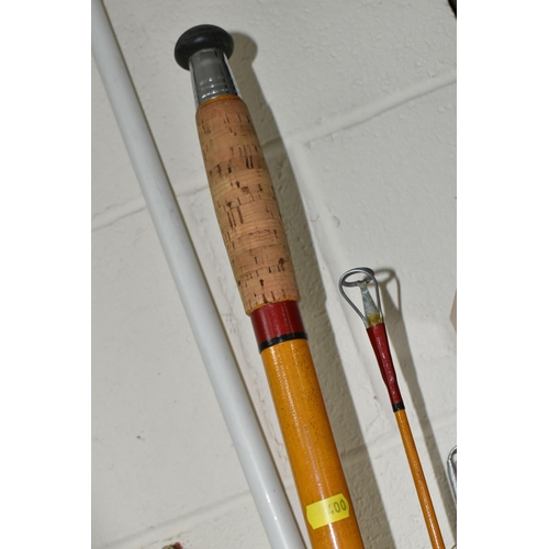 400 - A LARGE COLLECTION OF VINTAGE FISHING RODS, comprising a split cane 'Black Seal' 7432 rod, a 6m Midd... 