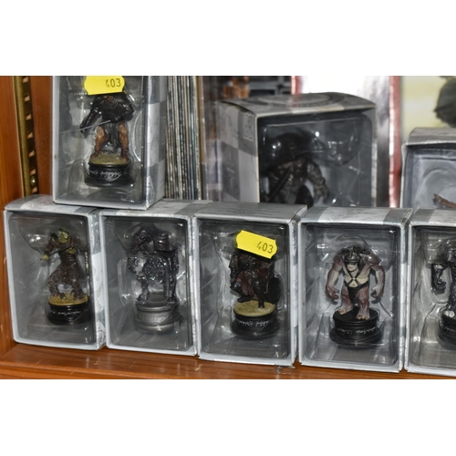 403 - A LARGE COLLECTION OF BOXED EAGLEMOSS 'LORD OF THE RINGS' FINAL BATTLE CHESS FIGURES AND CHESS BOARD... 