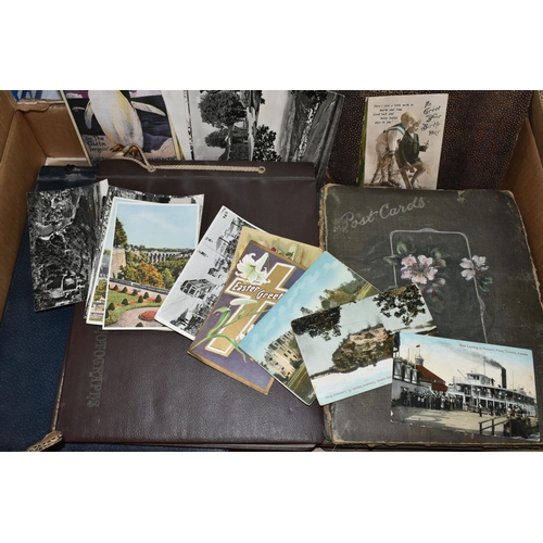 424 - ONE BOX OF PHOTOGRAPHS & POSTCARDS in four albums and loose, the photographs include a holiday in N.... 