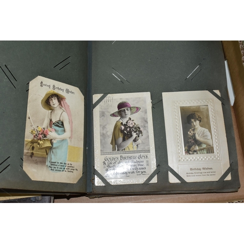 424 - ONE BOX OF PHOTOGRAPHS & POSTCARDS in four albums and loose, the photographs include a holiday in N.... 