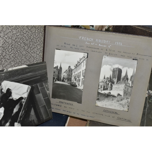 424 - ONE BOX OF PHOTOGRAPHS & POSTCARDS in four albums and loose, the photographs include a holiday in N.... 