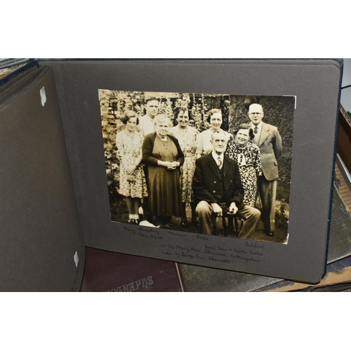 424 - ONE BOX OF PHOTOGRAPHS & POSTCARDS in four albums and loose, the photographs include a holiday in N.... 