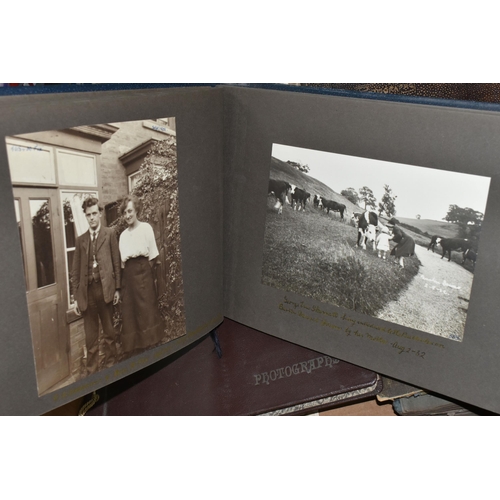 424 - ONE BOX OF PHOTOGRAPHS & POSTCARDS in four albums and loose, the photographs include a holiday in N.... 