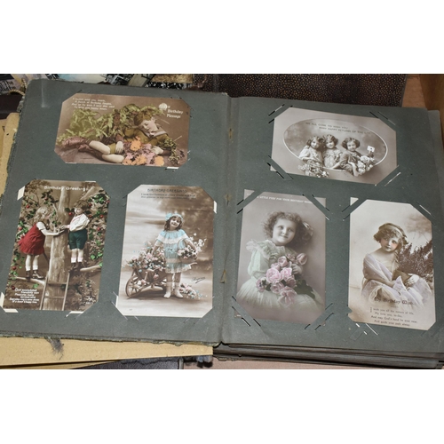 424 - ONE BOX OF PHOTOGRAPHS & POSTCARDS in four albums and loose, the photographs include a holiday in N.... 