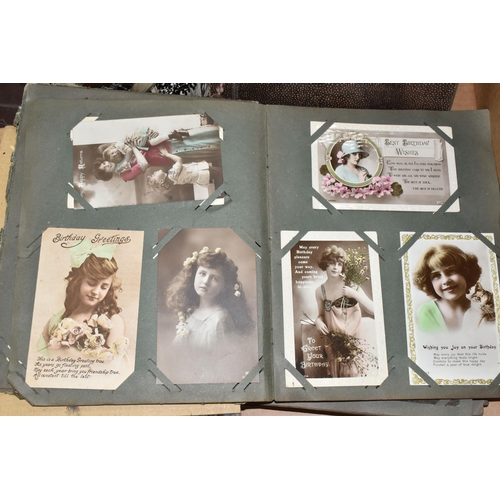 424 - ONE BOX OF PHOTOGRAPHS & POSTCARDS in four albums and loose, the photographs include a holiday in N.... 