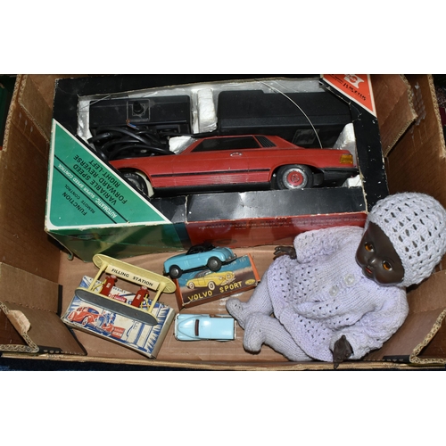 427 - THREE BOXES OF MISCELLANEOUS SUNDRIES, to include a Rosebud baby doll, a boxed Volvo Sport friction ... 