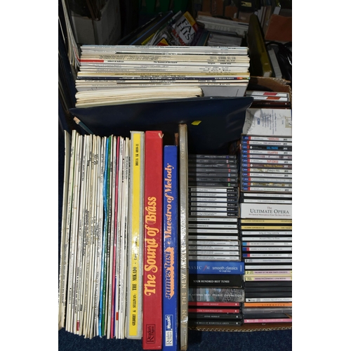 428 - TWO BOXES OF CDS AND LP RECORDS, to include a large quantity of CDs mostly classical music and music... 