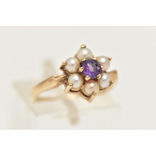 24 - A YELLOW METAL AMETHYST AND SPLIT PEARL CLUSTER RING, of a flower shape set to the centre with a cir... 