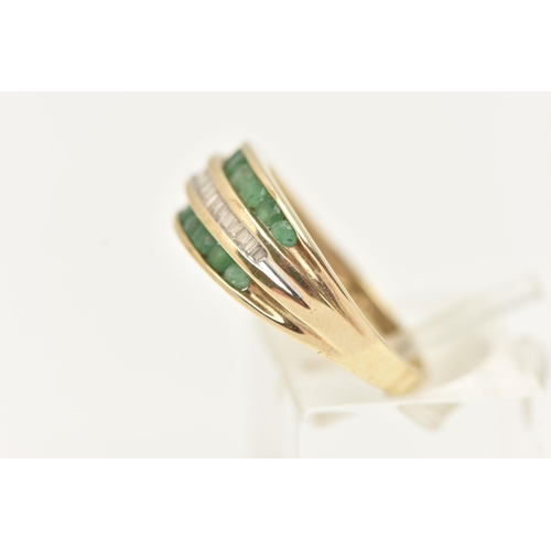 35 - A MODERN 9CT YELLOW GOLD DIAMOND AND EMERALD DRESS RING, designed as a three row ring, the central r... 