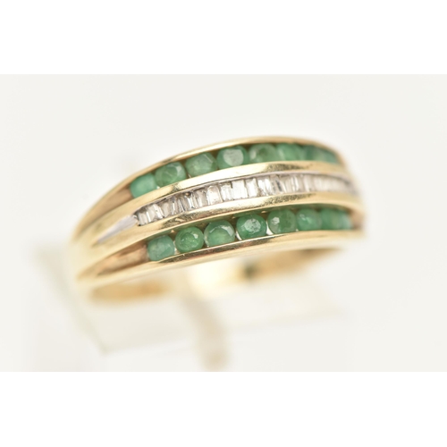 35 - A MODERN 9CT YELLOW GOLD DIAMOND AND EMERALD DRESS RING, designed as a three row ring, the central r... 