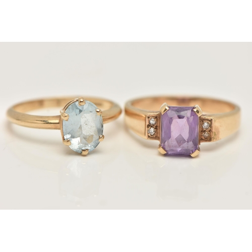 4 - TWO GEM SET RINGS, the first a single stone oval cut aquamarine, prong set in yellow gold, hallmarke... 