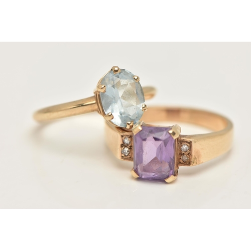 4 - TWO GEM SET RINGS, the first a single stone oval cut aquamarine, prong set in yellow gold, hallmarke... 