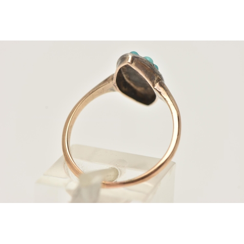 40 - A WHITE AND YELLOW METAL GEM SET CLUSTER RING, the ring is of marquise shape outline, set with three... 