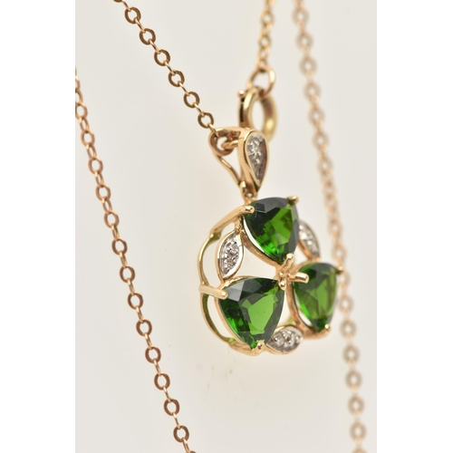 49 - A 9CT YELLOW GOLD TOURMALINE AND DIAMOND PENDANT WITH YELLOW METAL CHAIN, the pendant set with three... 