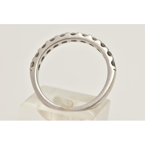 5 - A DIAMOND HALF ETERNITY BAND RING, white metal band ring prong set with eleven round brilliant cut d... 