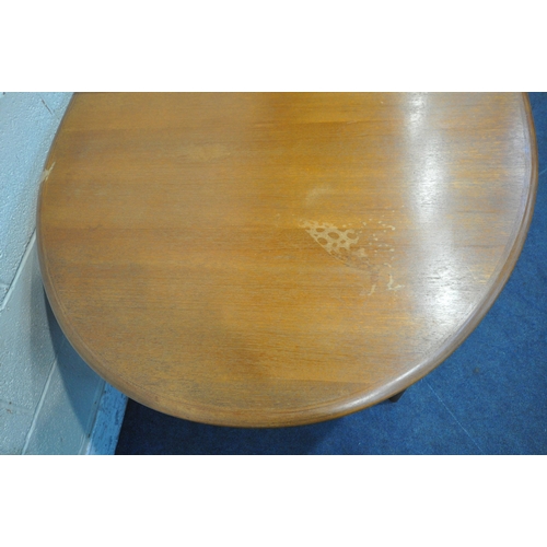 1223 - A MID CENTURY TEAK OVAL EXTENDING DINING TABLE, with two additional leaves, raised on cylindrical ta... 