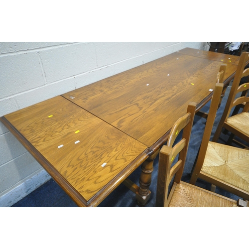 1225 - A LATE 20TH CENTURY OAK RECTANGULAR TABLE, with two additional leaves, length 251cm x depth 85cm x h... 