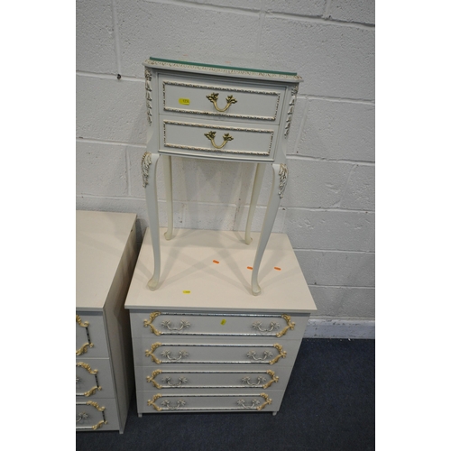 1234 - A CREAM FIVE PIECE BEDROOM SUITE, comprising a large dressing table, with seven drawers, length 184c... 