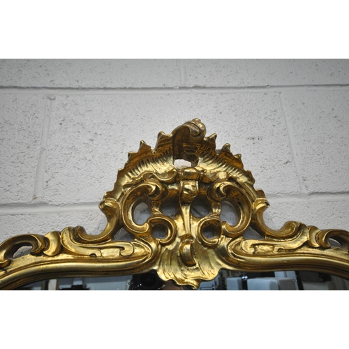 1242 - A REPRODUCTION GILT WOOD MARBLE TOP SERPENTINE CONSOLE TABLE, with scrolled details, width 128cm x d... 