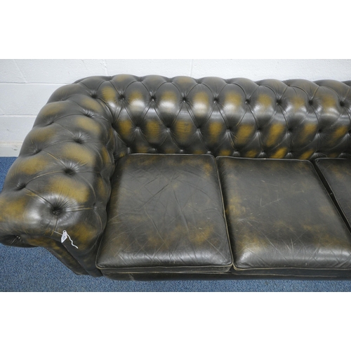 1243 - AN OLIVE GREEN THREE SEATER CHESTERFIELD SOFA, length 228cm x depth 90cm x height 74cm (condition re... 