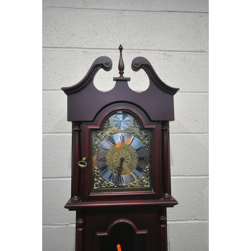 1244 - A MODERN MAHOGANY EFFECT LONGCASE CLOCK, with twin swan neck pediment, a single finial, the arched d... 