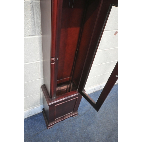 1244 - A MODERN MAHOGANY EFFECT LONGCASE CLOCK, with twin swan neck pediment, a single finial, the arched d... 