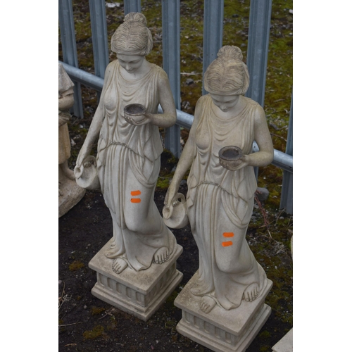 1002 - A SET OF FOUR RESIN GARDEN FIGURES, of semi clad ladies, max height 81cm (condition report: two show... 