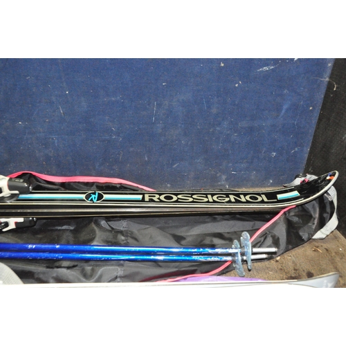 1051 - TWO SETS OF SKIs AND POLES comprising of a pair of Atomic 3D Carbon 170 and Tyrolian poles and a pai... 