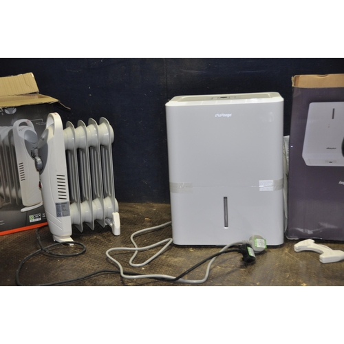 1063 - A CHALLENGE DEHUMIDIFIER with original box (appears to be new and unused), a Daewoo small oil filled... 