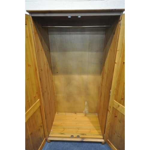 1252 - A MODERN PINE DOUBLE DOOR WARDROBE, width 90cm x depth 56cm x height 176cm (condition report: marks,... 