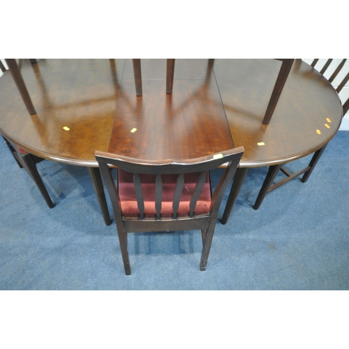 1253 - A STAG MINSTREL EXTENDING DINING TABLE, extended length 160cm x diameter 116cm x height 75cm, along ... 