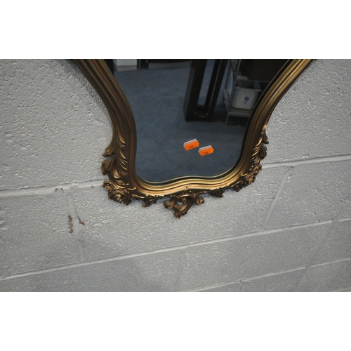 1258 - A SYROCO GILT FRAME FLAMBOYANT WALL MIRROR, 50cm x 74cm, along with another wall mirror (2)