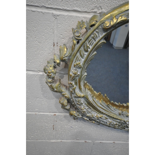 1267 - A FLAMBOYANT OVAL PAINTED MIRROR, 100cm x 73cm (condition report: small chips to frame, losses to pa... 