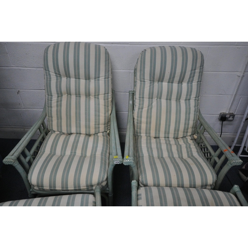 1278 - A MINT GREEN SEVEN PIECE CONSERVATORY SUITE, comprising a pair of armchairs, a pair of foot stools, ... 