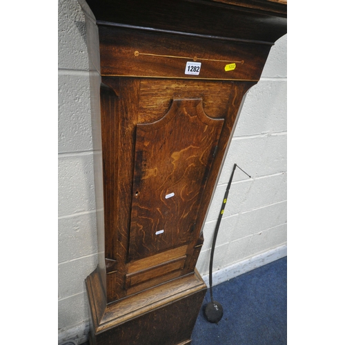 1282 - AN EARLY 19TH CENTURY OAK LONGCASE CLOCK, with three brass finials, twin swan neck pediment, the arc... 