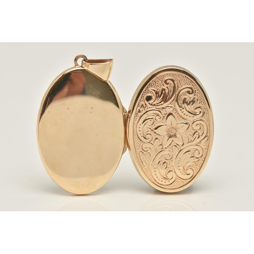 10 - A 9CT GOLD OVAL LOCKET, floral detailed oval hinged locket, fitted with a tapered bail, hallmarked 9... 