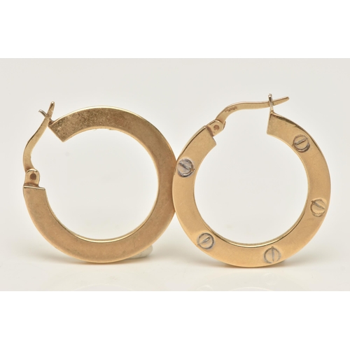 24 - A PAIR OF 9CT GOLD HOOP EARRINGS, yellow gold flat hoops with screw design detail, fitted with hinge... 