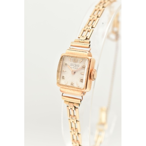 33 - A WATCH, the Sully watch with white square face, the head reverse stamped 18K 0.750, to the gate str... 